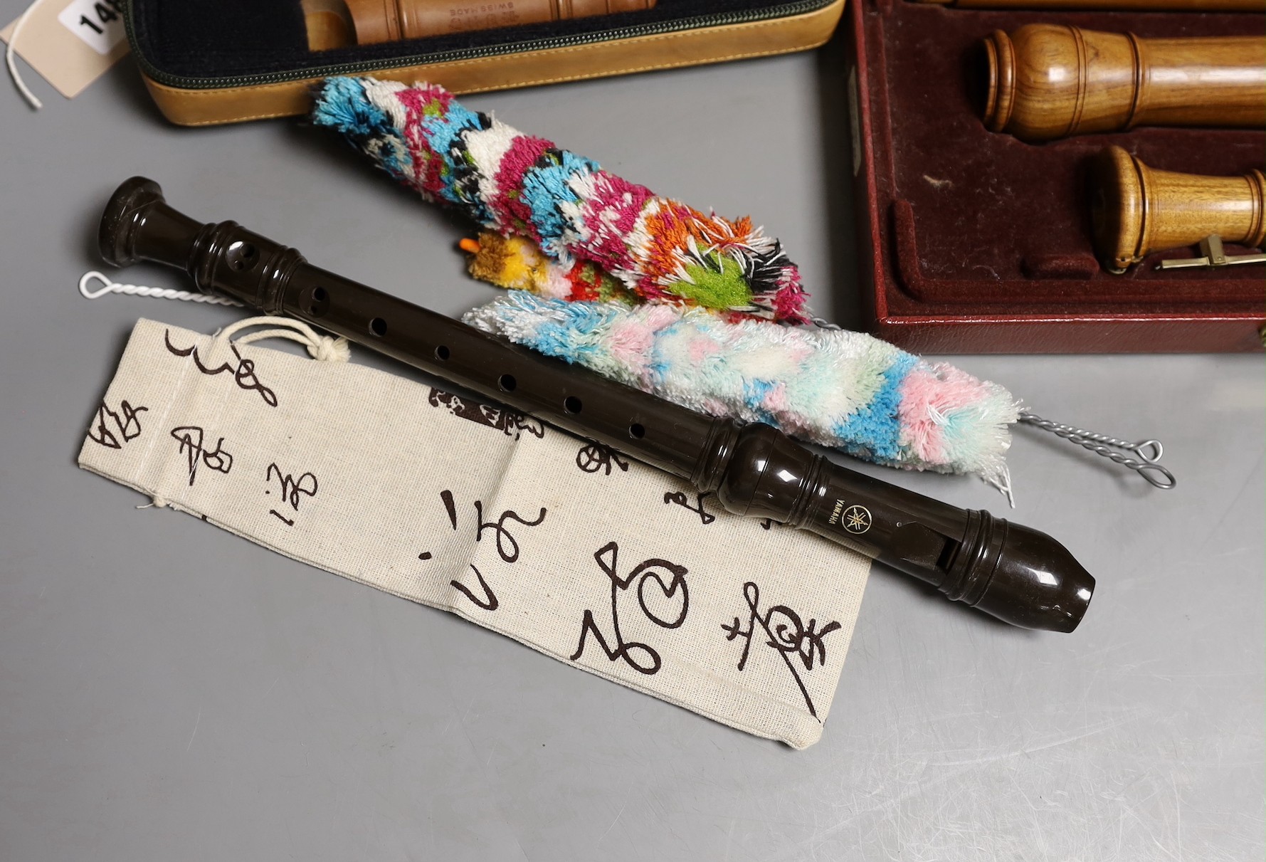 Two cased recorders, one other and a metronome etc
